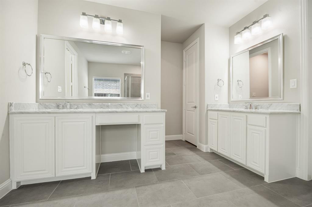 1506 Mariners Hope Way Wylie, TX 75098 - Photo 19 of 39 a bathroom with a sink and a mirror