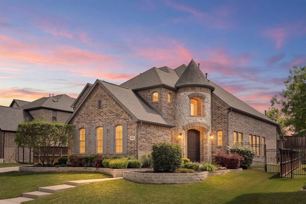 1506 Mariners Hope Way Wylie, TX 75098 - Photo 2 of 39 a front view of a house with a yard