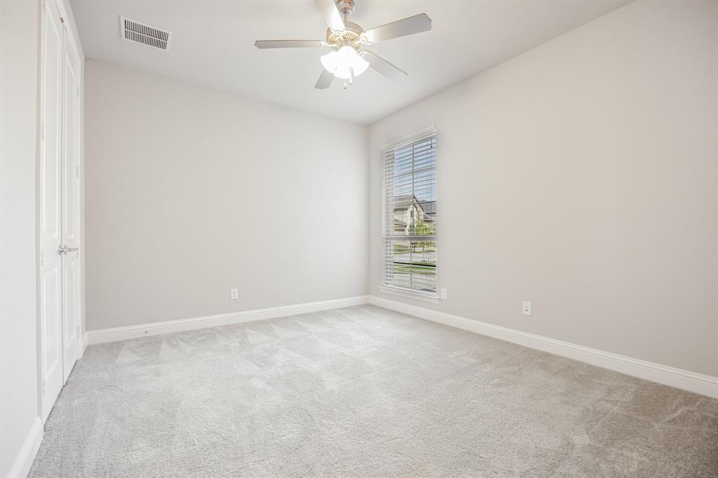 1506 Mariners Hope Way Wylie, TX 75098 - Photo 23 of 39 an empty room with windows and fan