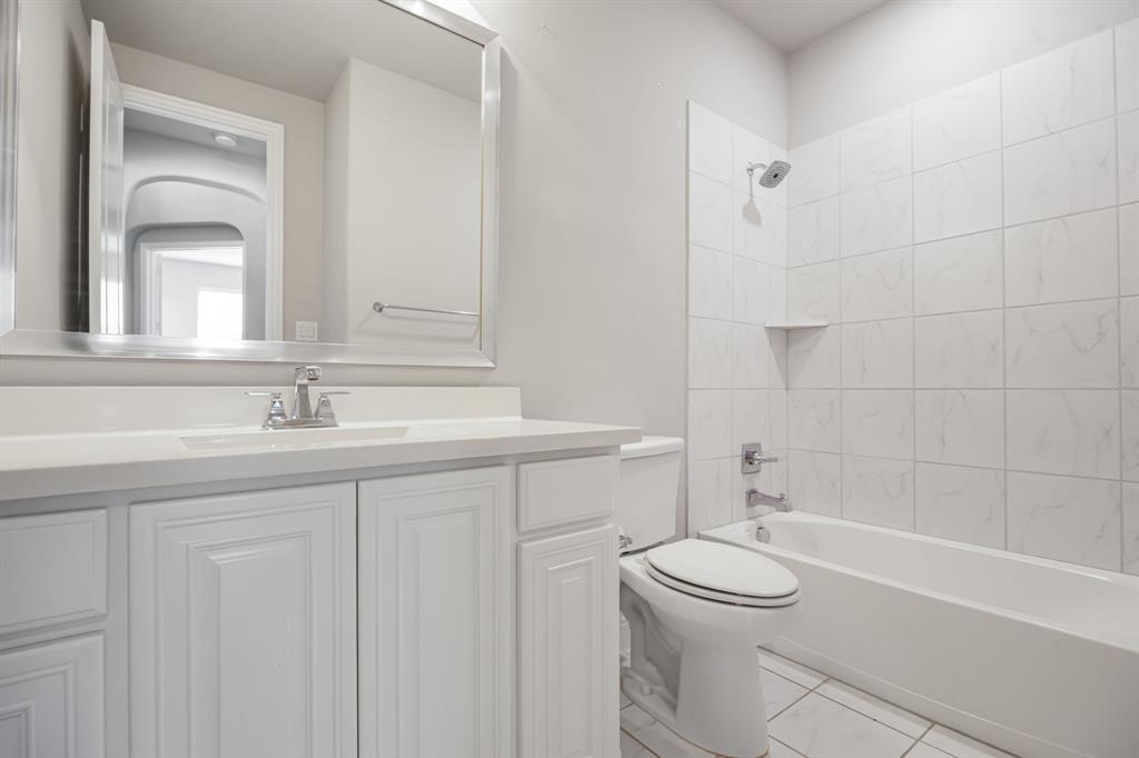 1506 Mariners Hope Way Wylie, TX 75098 - Photo 24 of 39 a bathroom with a sink a toilet and shower