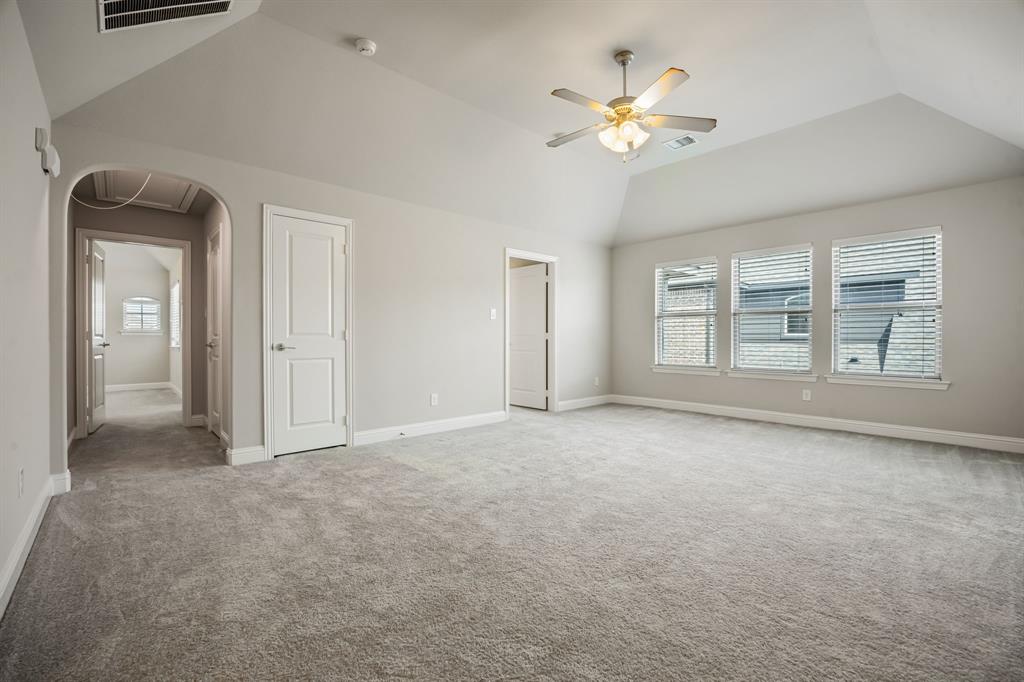 1506 Mariners Hope Way Wylie, TX 75098 - Photo 25 of 39 a view of an empty room with chandelier fan