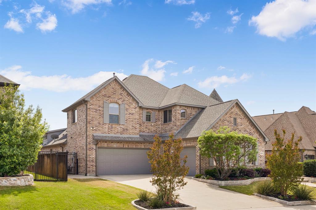 1506 Mariners Hope Way Wylie, TX 75098 - Photo 3 of 39 a front view of a house with a yard and garage