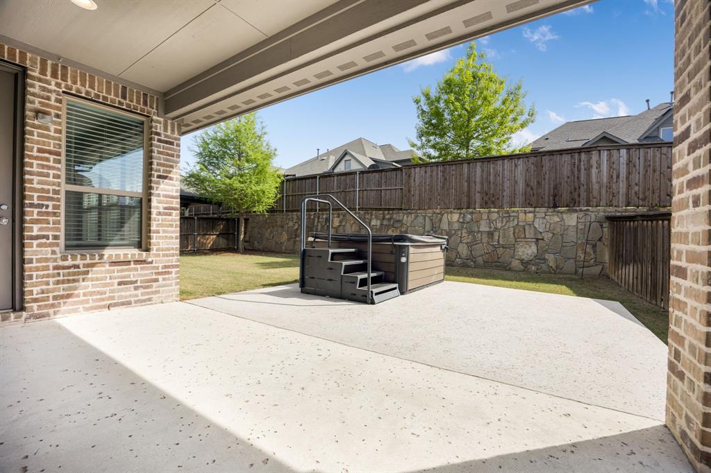 1506 Mariners Hope Way Wylie, TX 75098 - Photo 31 of 39 a view of a backyard with a sink and outdoor seating