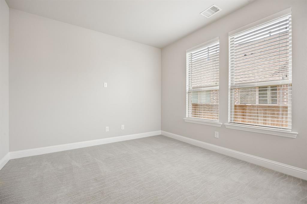 1506 Mariners Hope Way Wylie, TX 75098 - Photo 6 of 39 an empty room with a window