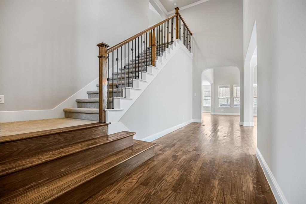 1506 Mariners Hope Way Wylie, TX 75098 - Photo 7 of 39 a view of entryway and hall with wooden floor