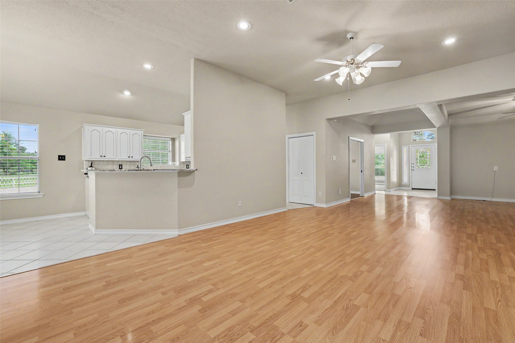 30107 Hamlet Circle Georgetown, TX 78628 - Photo 40 of 40 An open floorplan seamlessly connects the well-lit kitchen and spacious living areas, ideal for modern living.