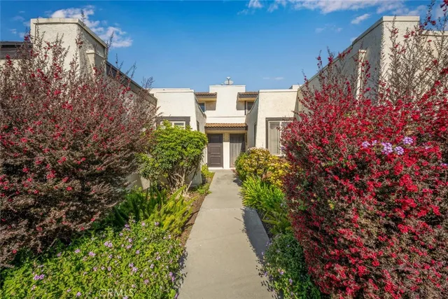 a view of a pathway with a building in the background