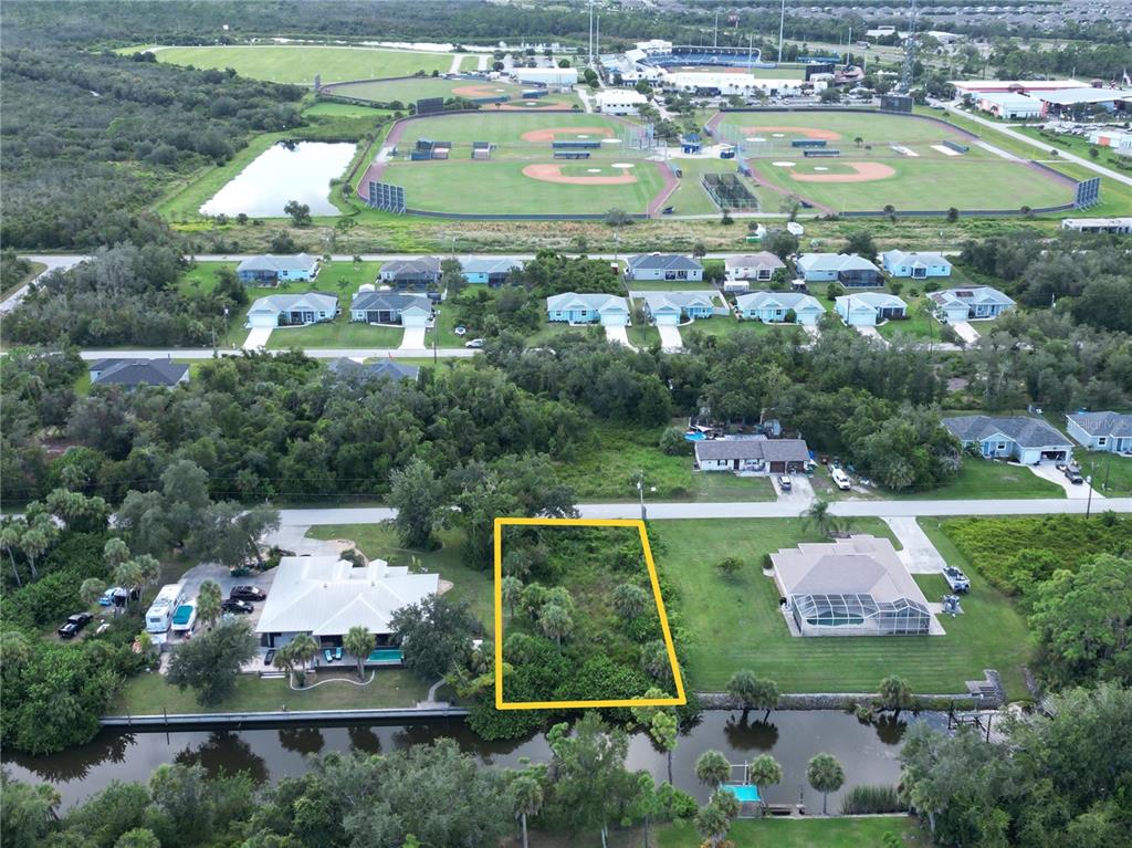 2206 Tea Street Port Charlotte, FL 33948 - Photo 2 of 3 an aerial view of a house with a yard