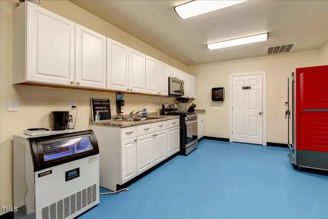 an aerial view of a house with a garden