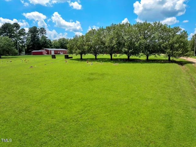 a bathroom with a sink double vanity and a mirror