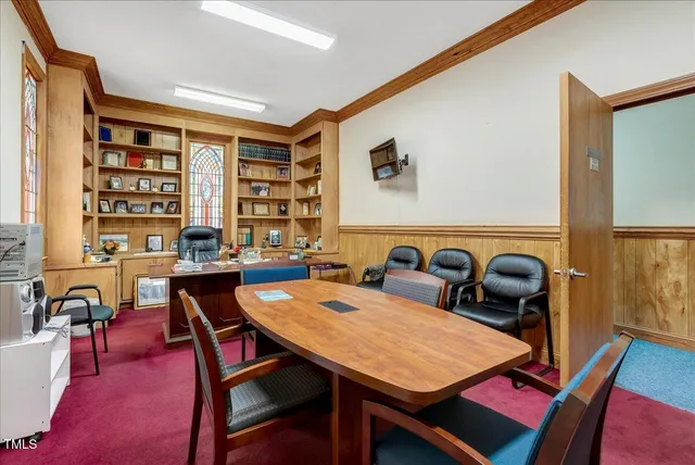 a kitchen with stainless steel appliances granite countertop a refrigerator and a stove
