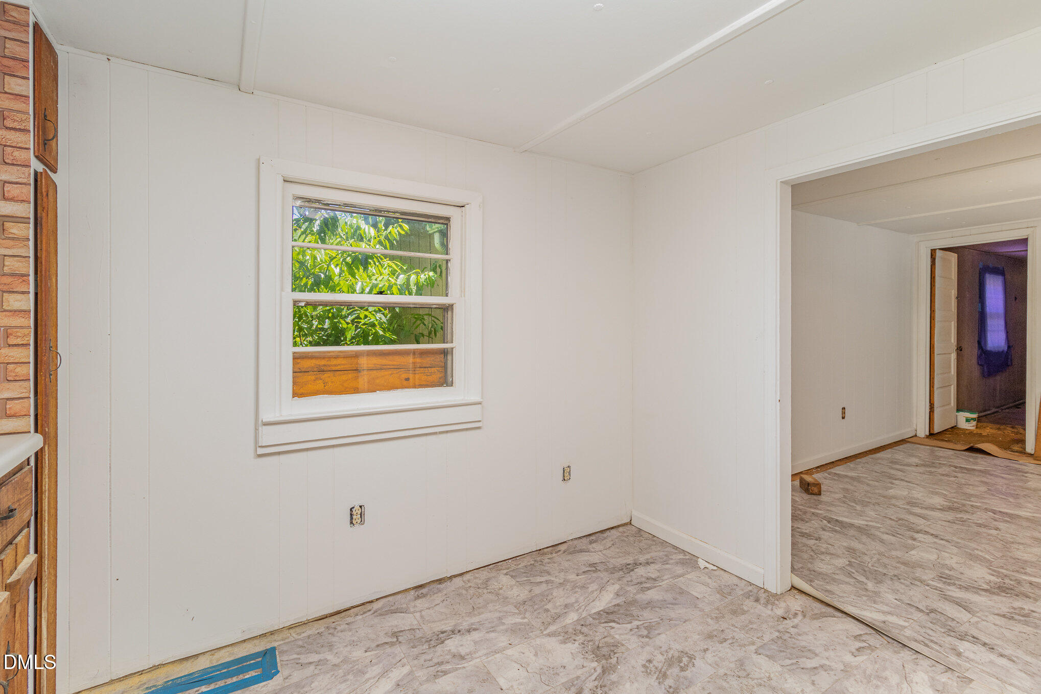 495 Horseshoe Road Aberdeen, NC 28315 - Photo 10 of 16 an empty room with windows