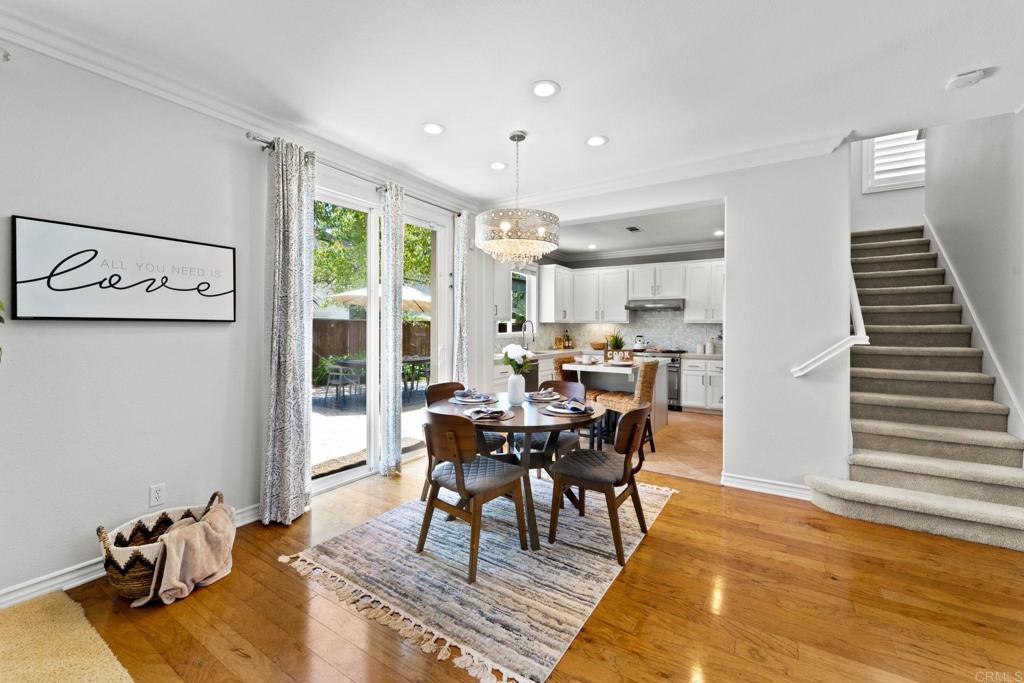 871 First Light Road San Marcos, CA 92078 - Photo 28 of 45 a view of a dining room with furniture window and wooden floor