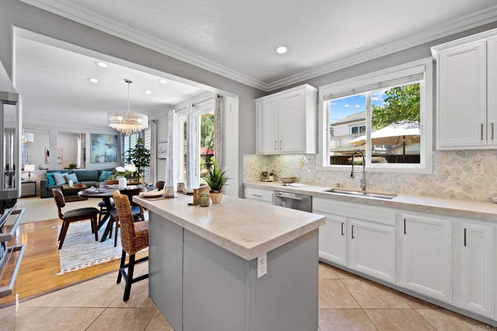 871 First Light Road San Marcos, CA 92078 - Photo 34 of 45 a kitchen with sink cabinets and outdoor view