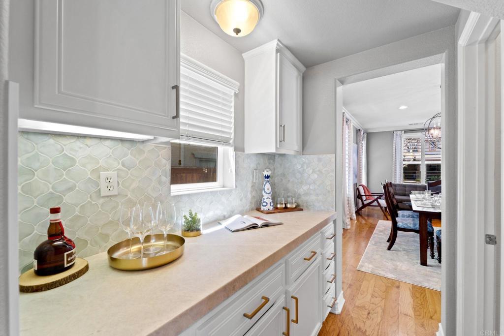 871 First Light Road San Marcos, CA 92078 - Photo 38 of 45 a kitchen with a sink and cabinets