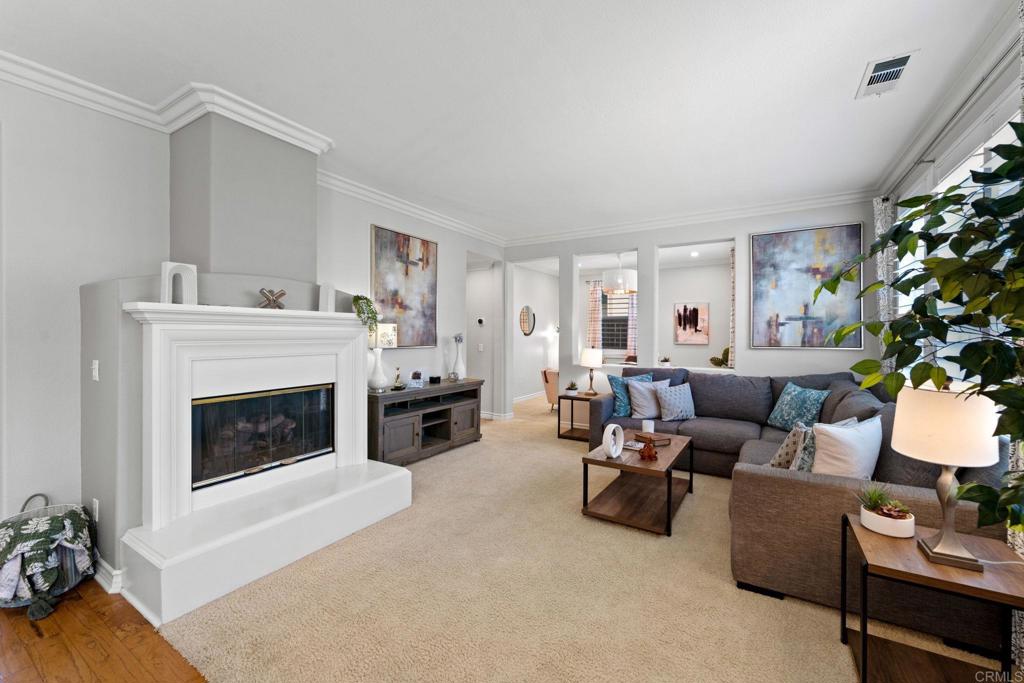 871 First Light Road San Marcos, CA 92078 - Photo 40 of 45 a living room with furniture and a fireplace