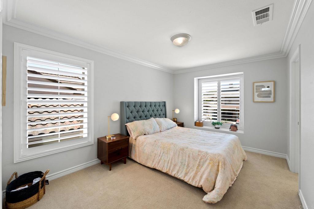 871 First Light Road San Marcos, CA 92078 - Photo 7 of 45 a bedroom with a bed and a window