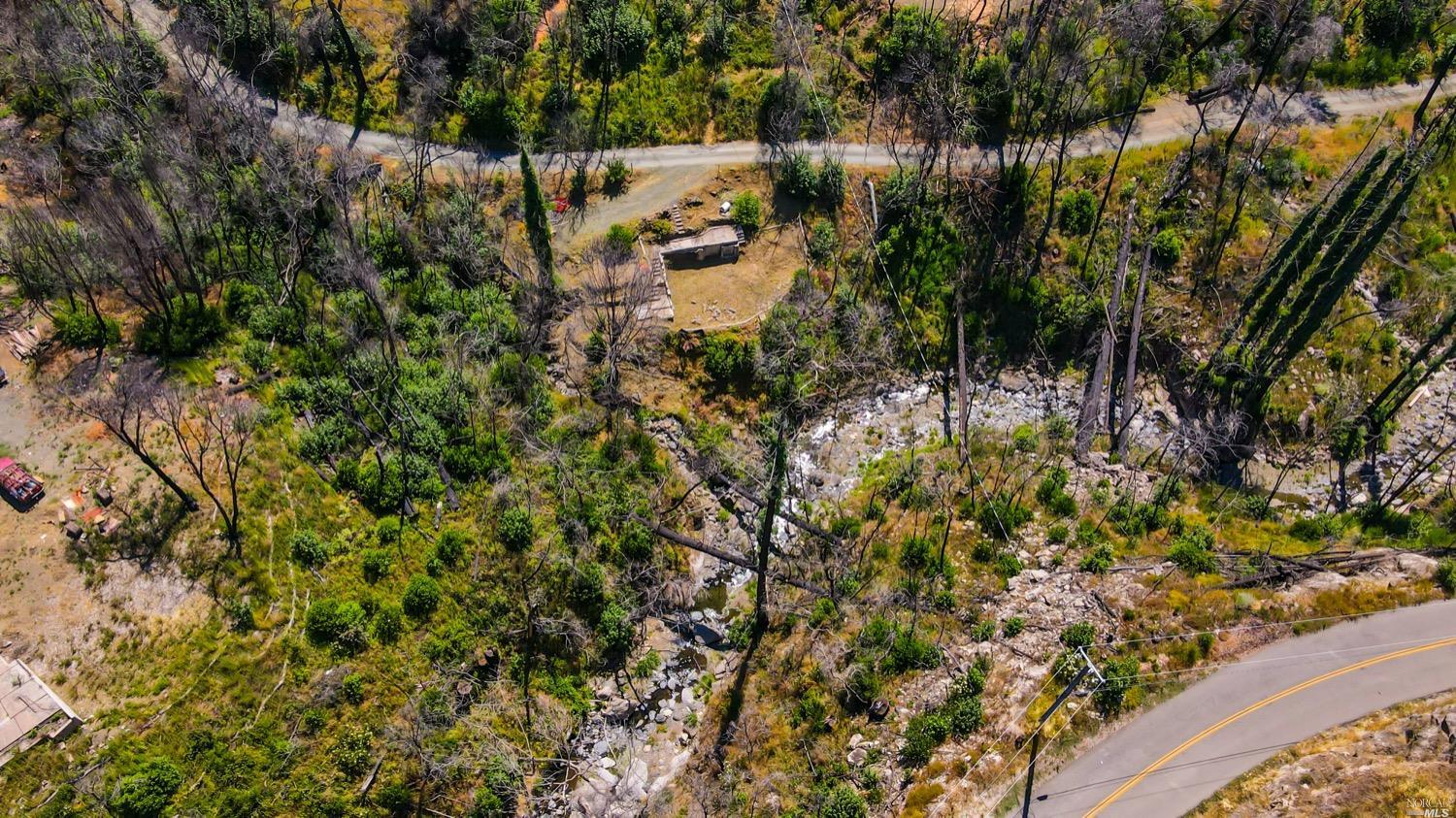 7625 Tarwater Road Santa Rosa, CA 95404 - Photo 1 of 1 a view of a lake with a tree