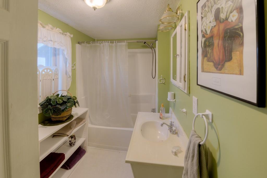 39 Bennett Road Wilbraham, MA 01095 - Photo 11 of 24 a bathroom with a sink and a bathtub