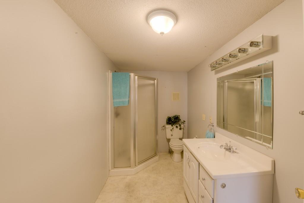 39 Bennett Road Wilbraham, MA 01095 - Photo 16 of 24 a bathroom with a sink and mirror with toilet