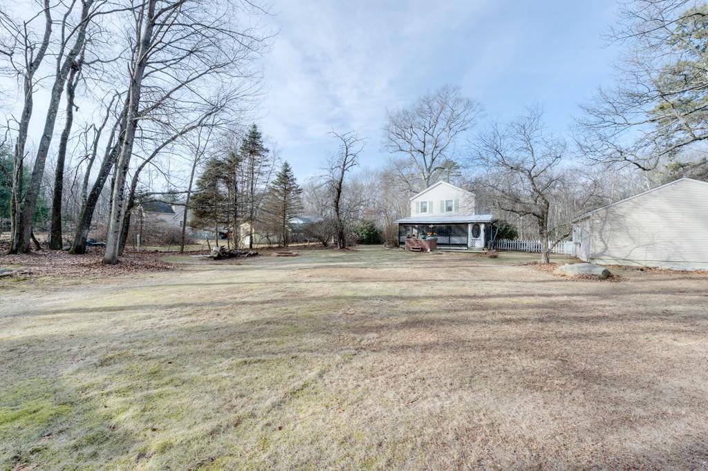39 Bennett Road Wilbraham, MA 01095 - Photo 24 of 24 a front view of a house with a yard covered with snow