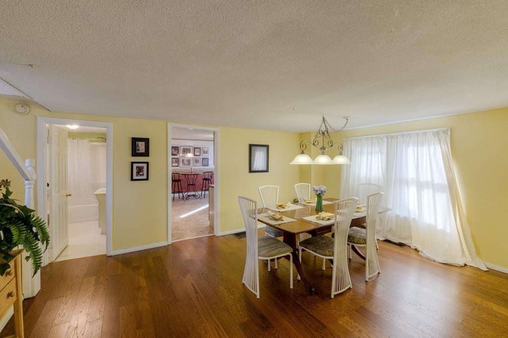 39 Bennett Road Wilbraham, MA 01095 - Photo 10 of 24 a dining room with furniture and wooden floor