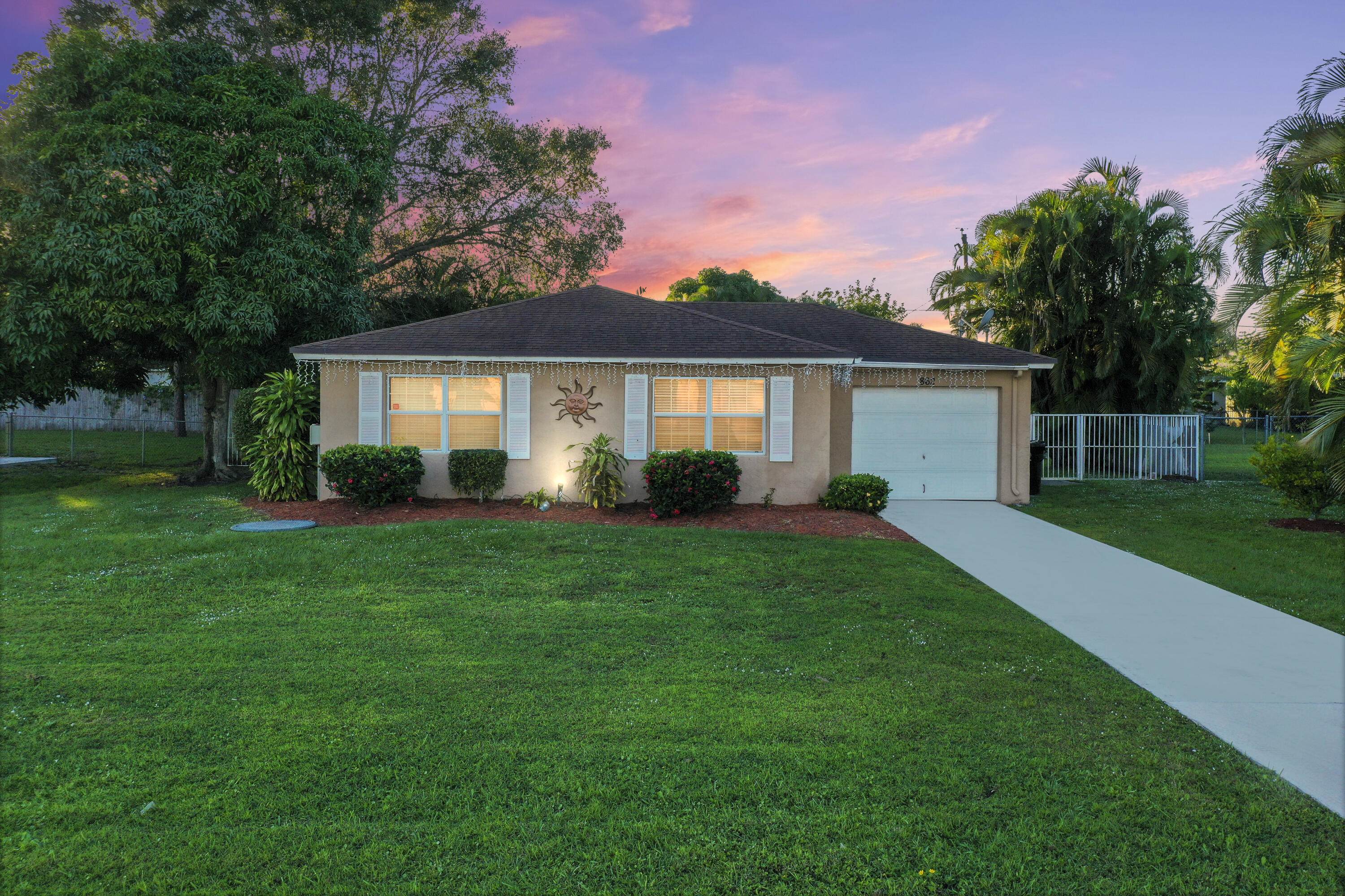 862 Southwest Curtis Street Port St. Lucie, FL 34983 - Photo 25 of 25 Twighlight view