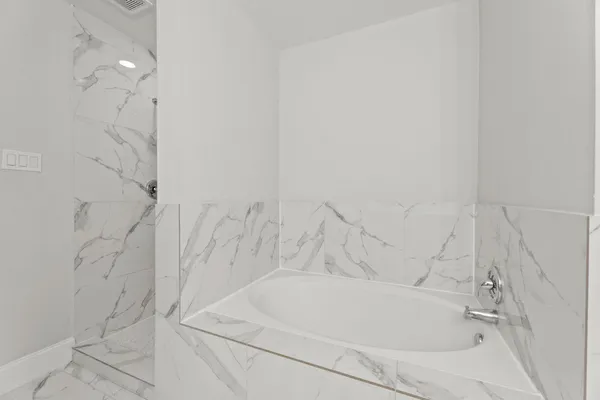 a bathroom with a bathtub