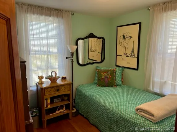 a room with furniture and a window