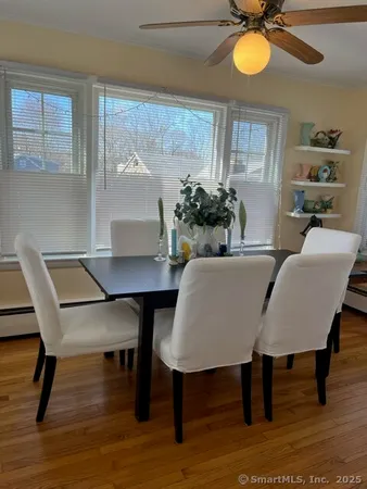 a view of a dining room with furniture