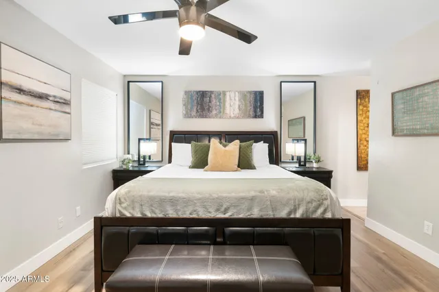 a bedroom with a bed and window