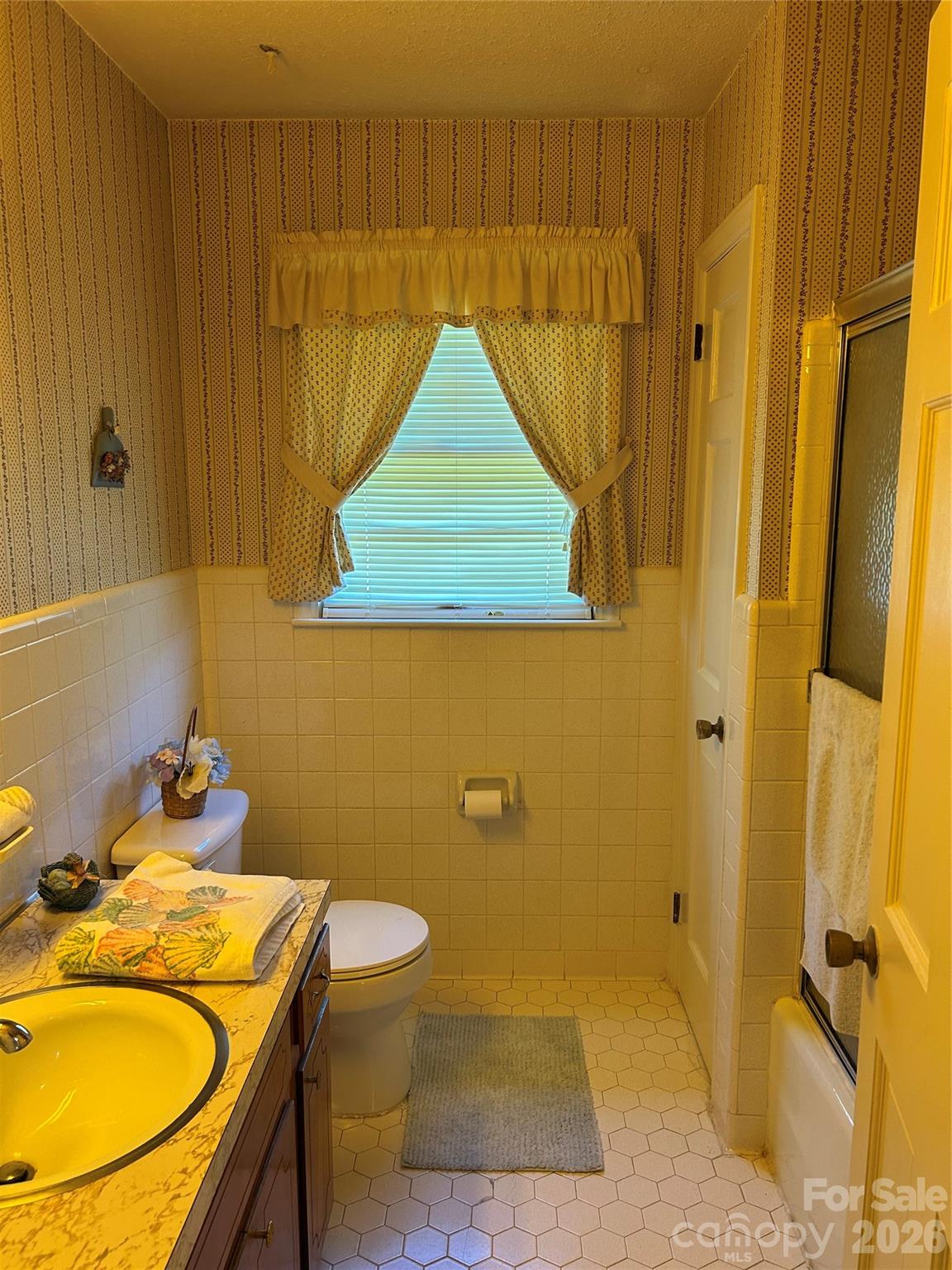 336 Bridges Road Blacksburg, SC 29702 - Photo 17 of 26 a bathroom with a sink a toilet and shower