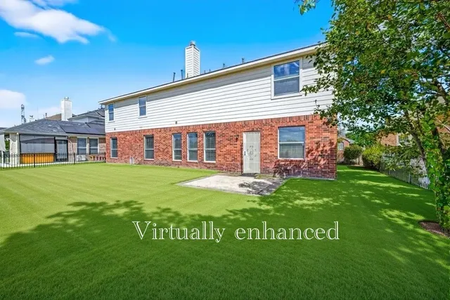 a front view of house with yard