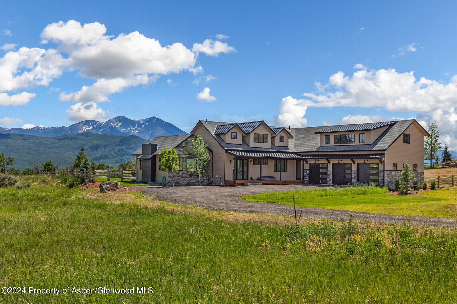 577 Fox Run Drive Carbondale, CO 81623 - Photo 2 of 67 a front view of a house with a garden