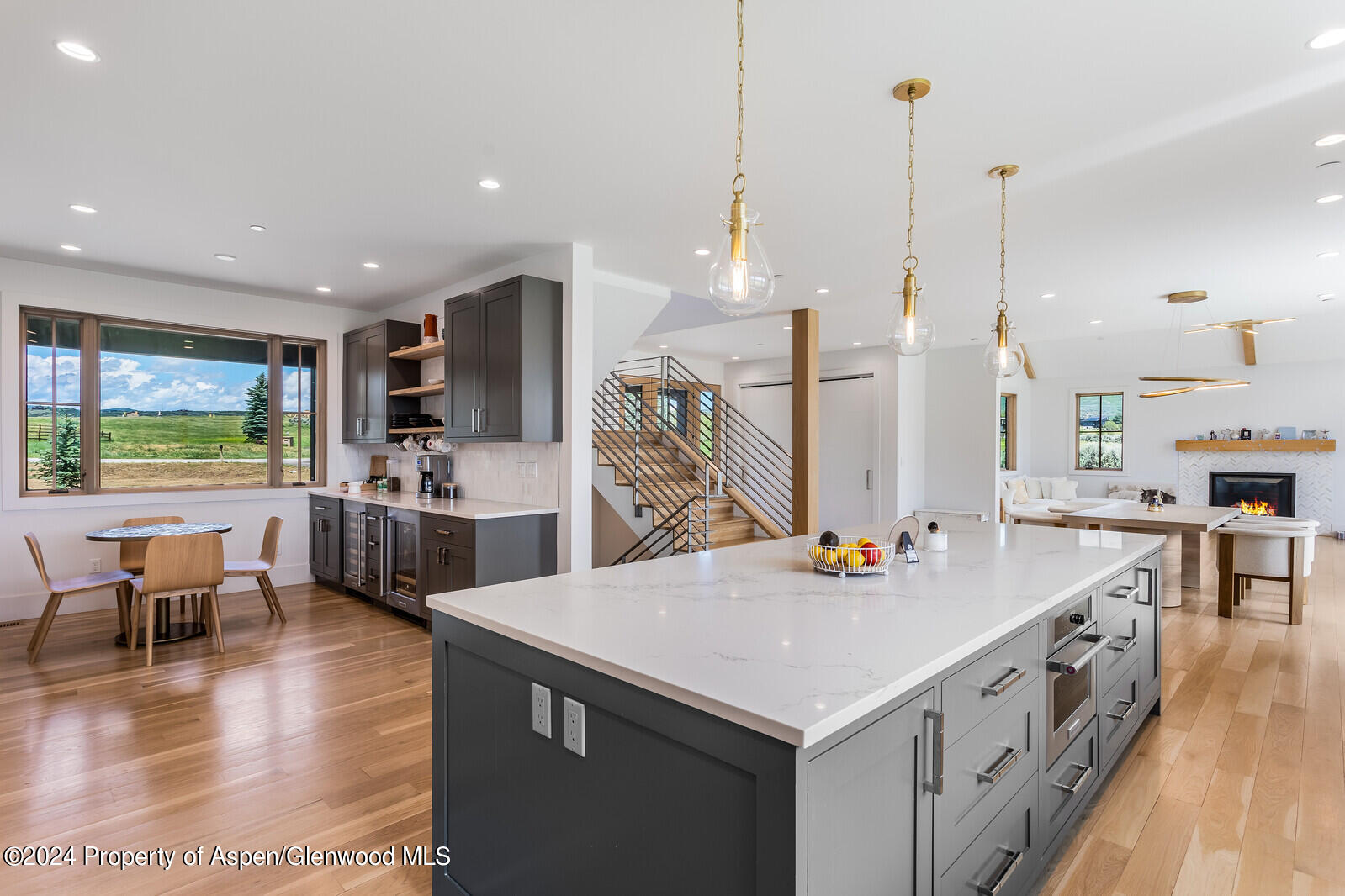 577 Fox Run Drive Carbondale, CO 81623 - Photo 22 of 67 a kitchen with stainless steel appliances granite countertop a sink a stove and a wooden floor
