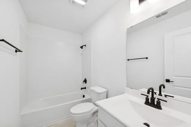 a picture of a bath tub sitting in a bathroom