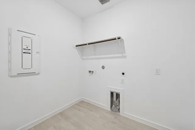 a picture of a bathroom with a sink and a mirror