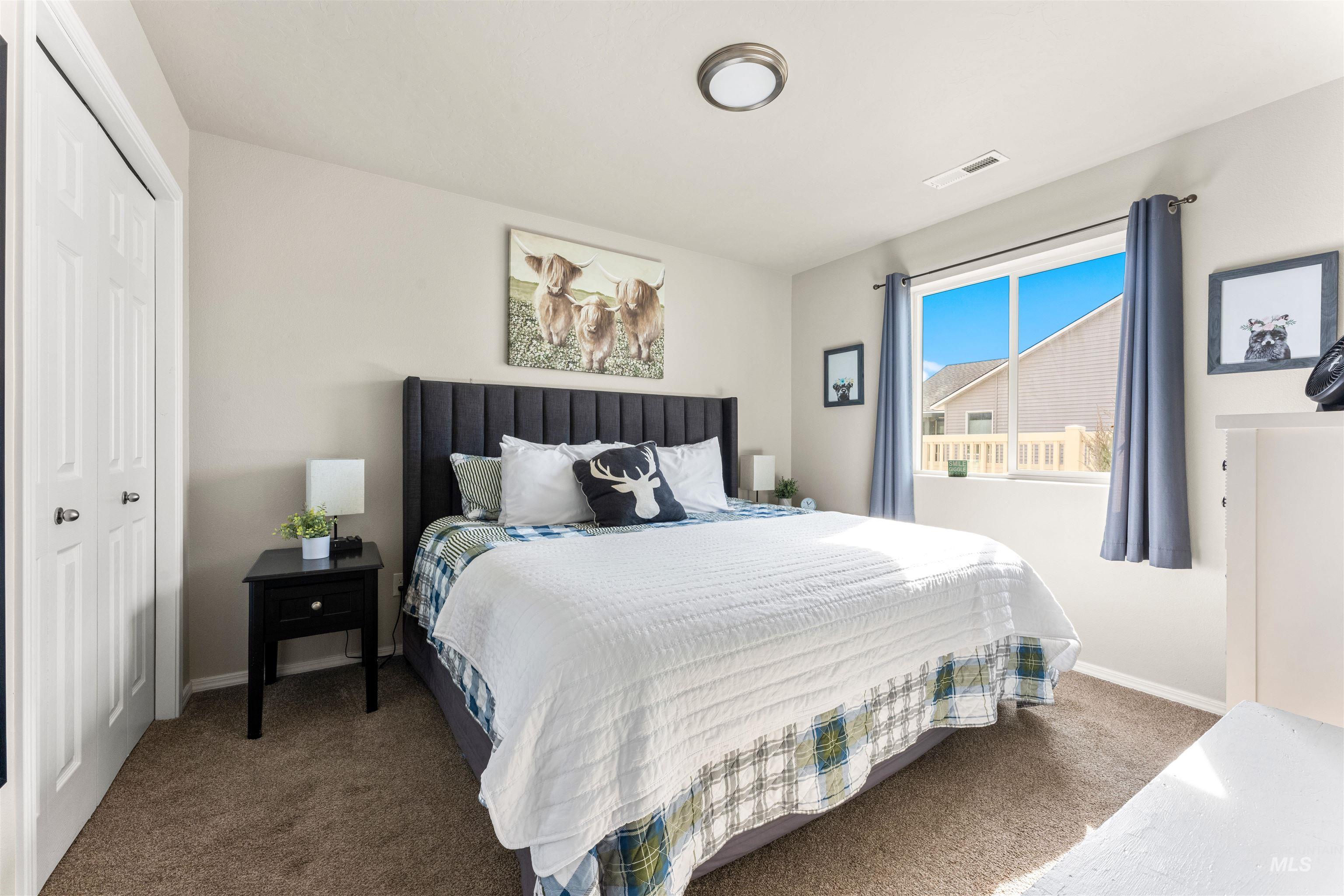 16378 Kelso Way Caldwell, ID 83607 - Photo 18 of 34 Bedroom with a closet and carpet floors