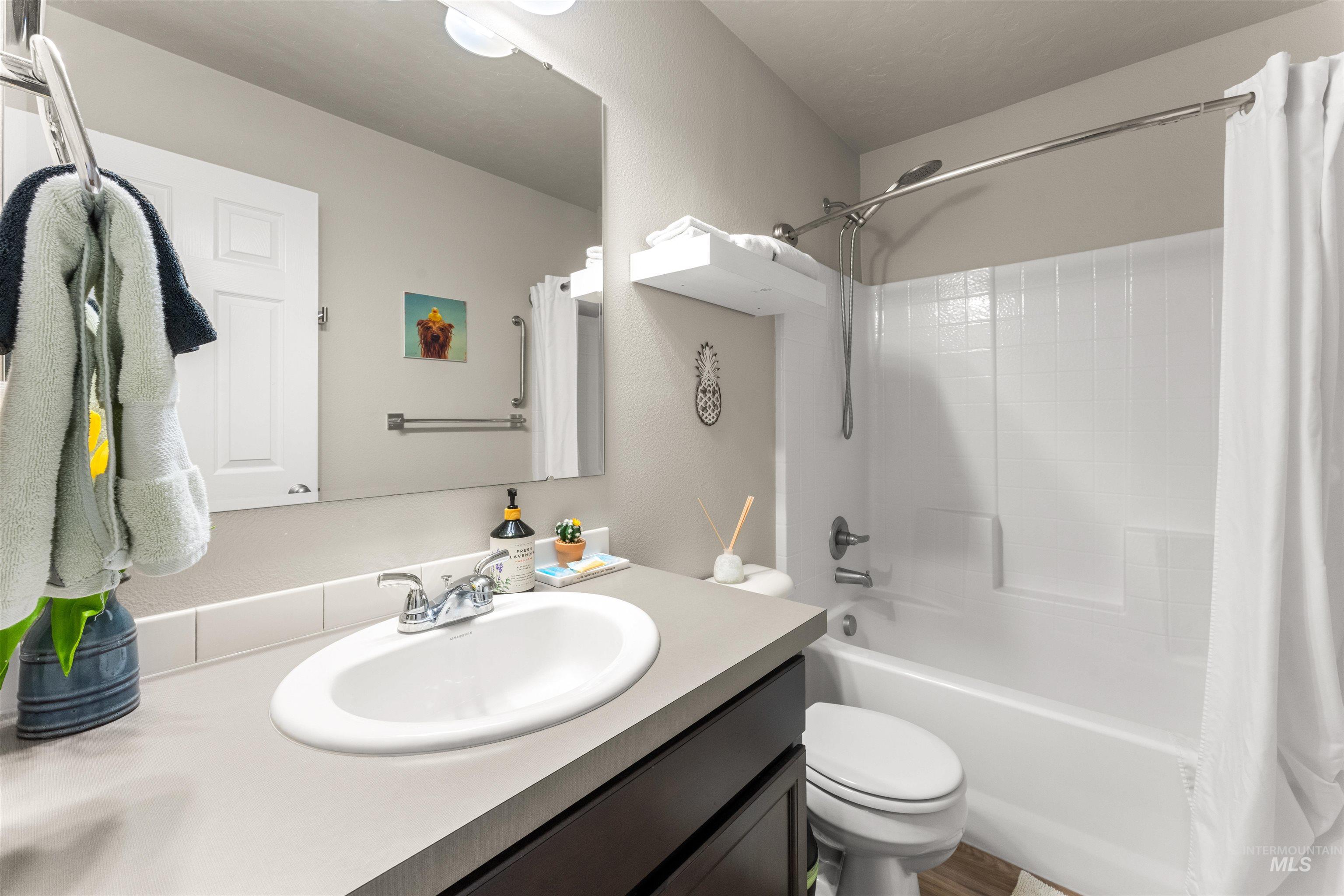 16378 Kelso Way Caldwell, ID 83607 - Photo 19 of 34 Full bath with vanity and shower / bath combination with curtain