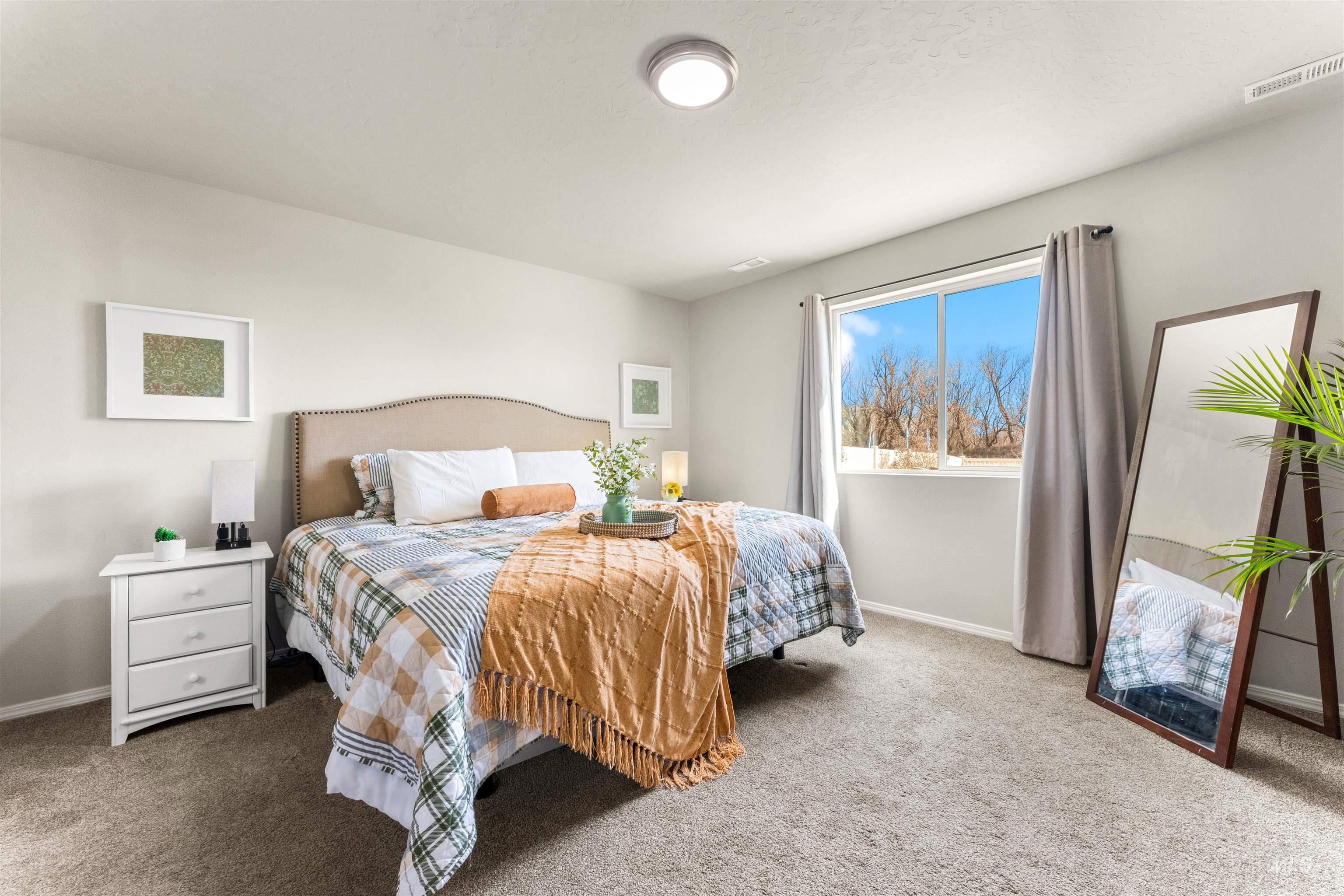 16378 Kelso Way Caldwell, ID 83607 - Photo 25 of 34 Bedroom featuring baseboards and carpet
