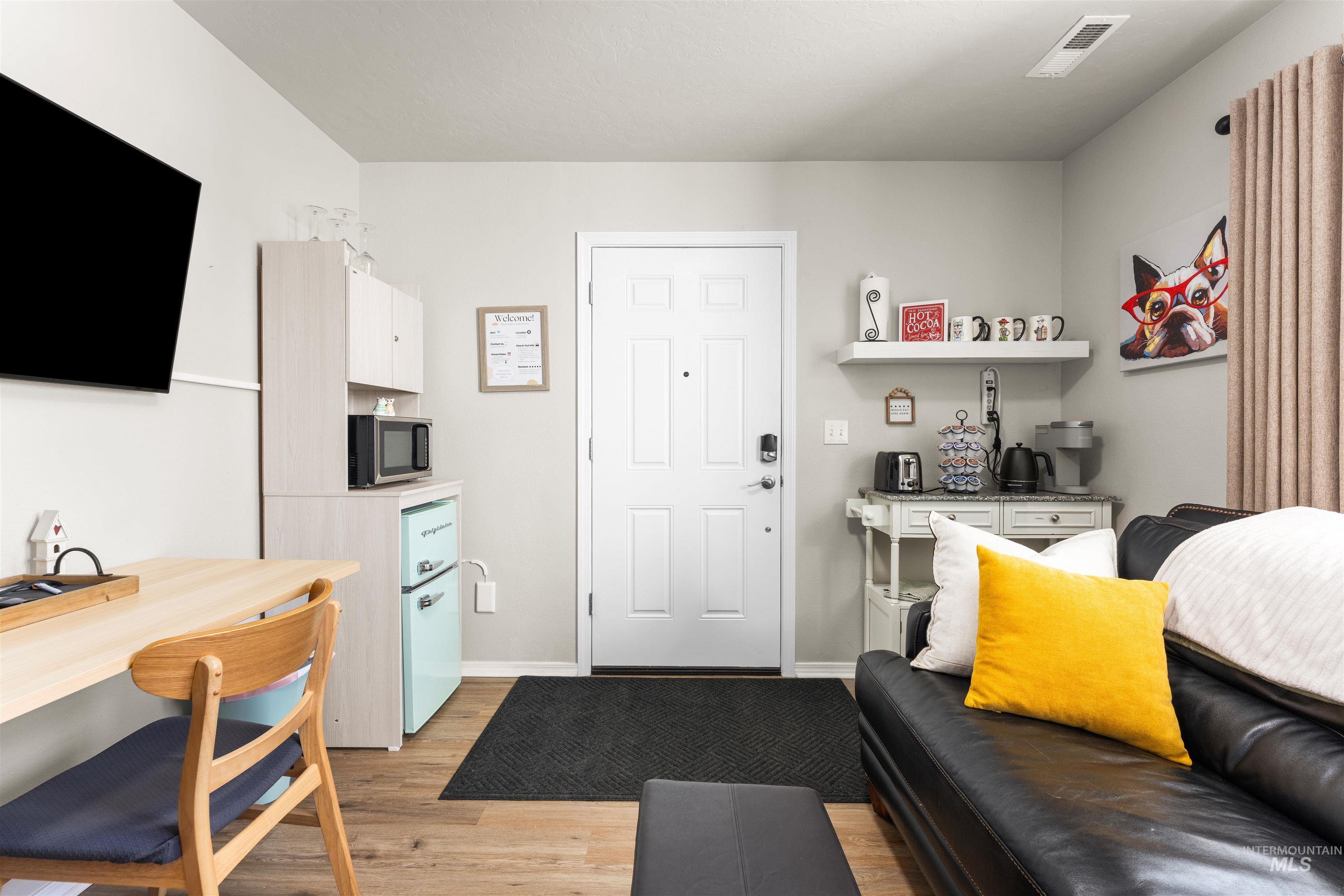 16378 Kelso Way Caldwell, ID 83607 - Photo 28 of 34 Living room with light wood finished floors and baseboards