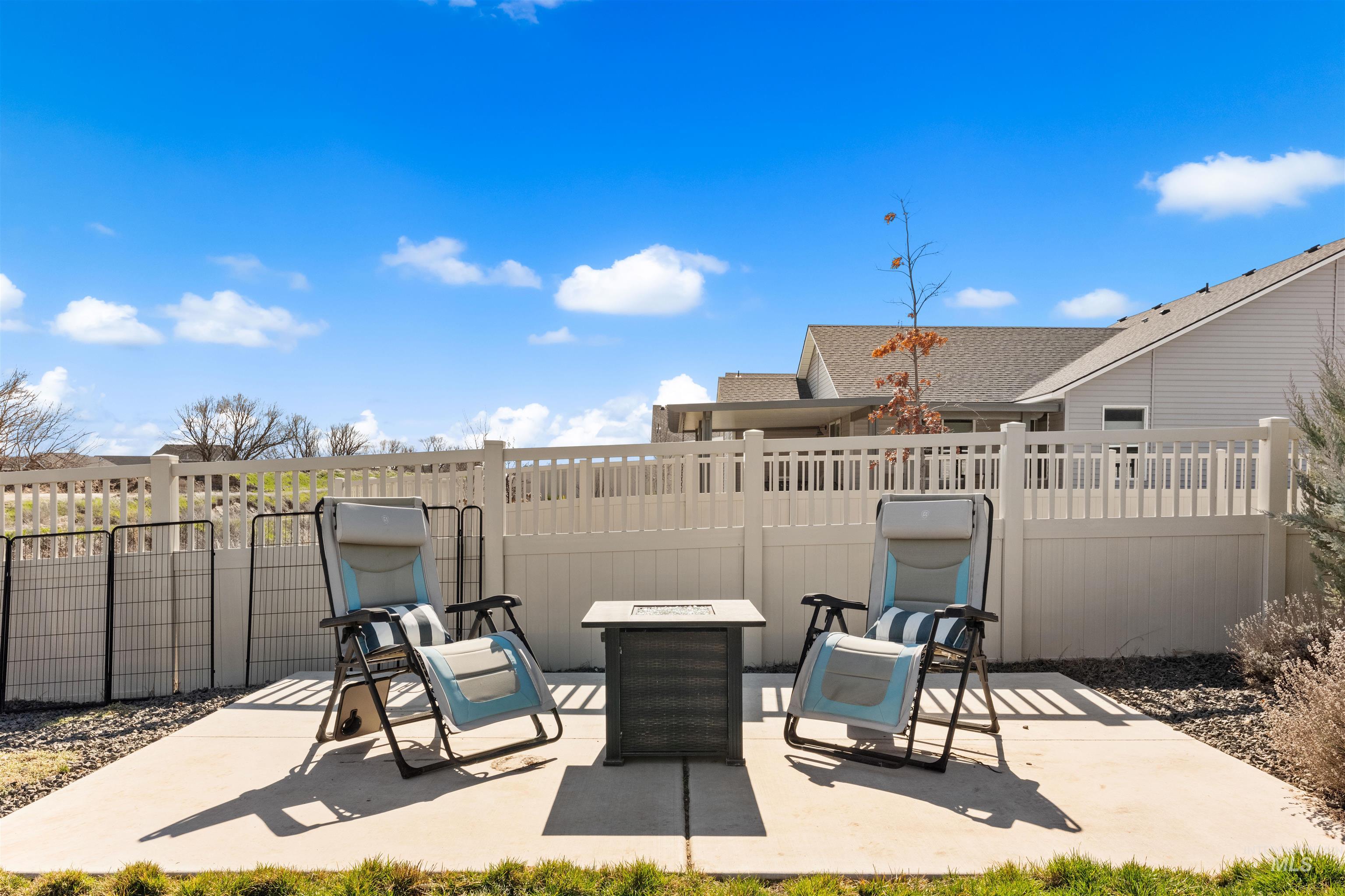 16378 Kelso Way Caldwell, ID 83607 - Photo 30 of 34 Fenced backyard featuring a patio and an outdoor fire pit