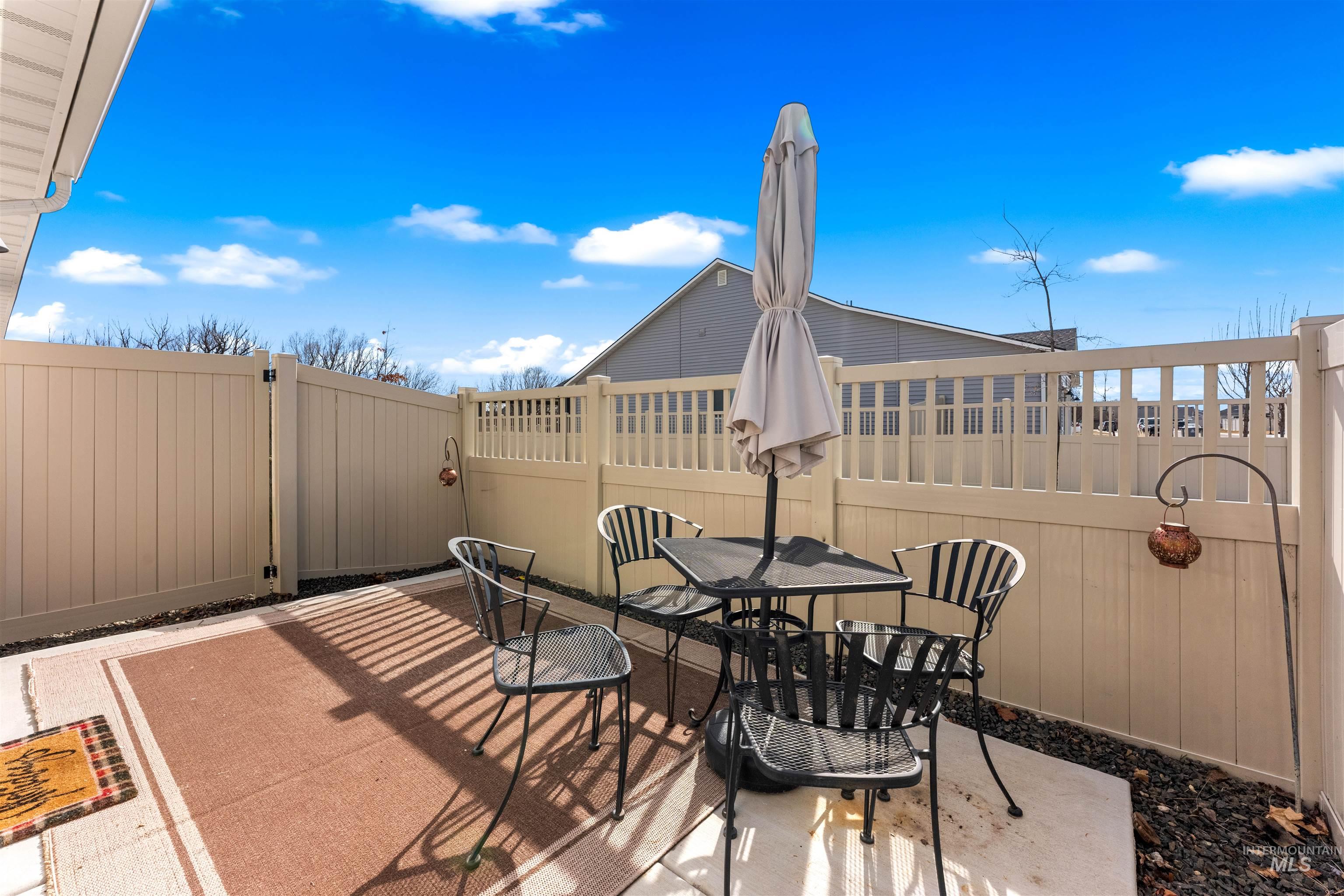 16378 Kelso Way Caldwell, ID 83607 - Photo 4 of 34 Fenced backyard featuring a patio area and outdoor dining area