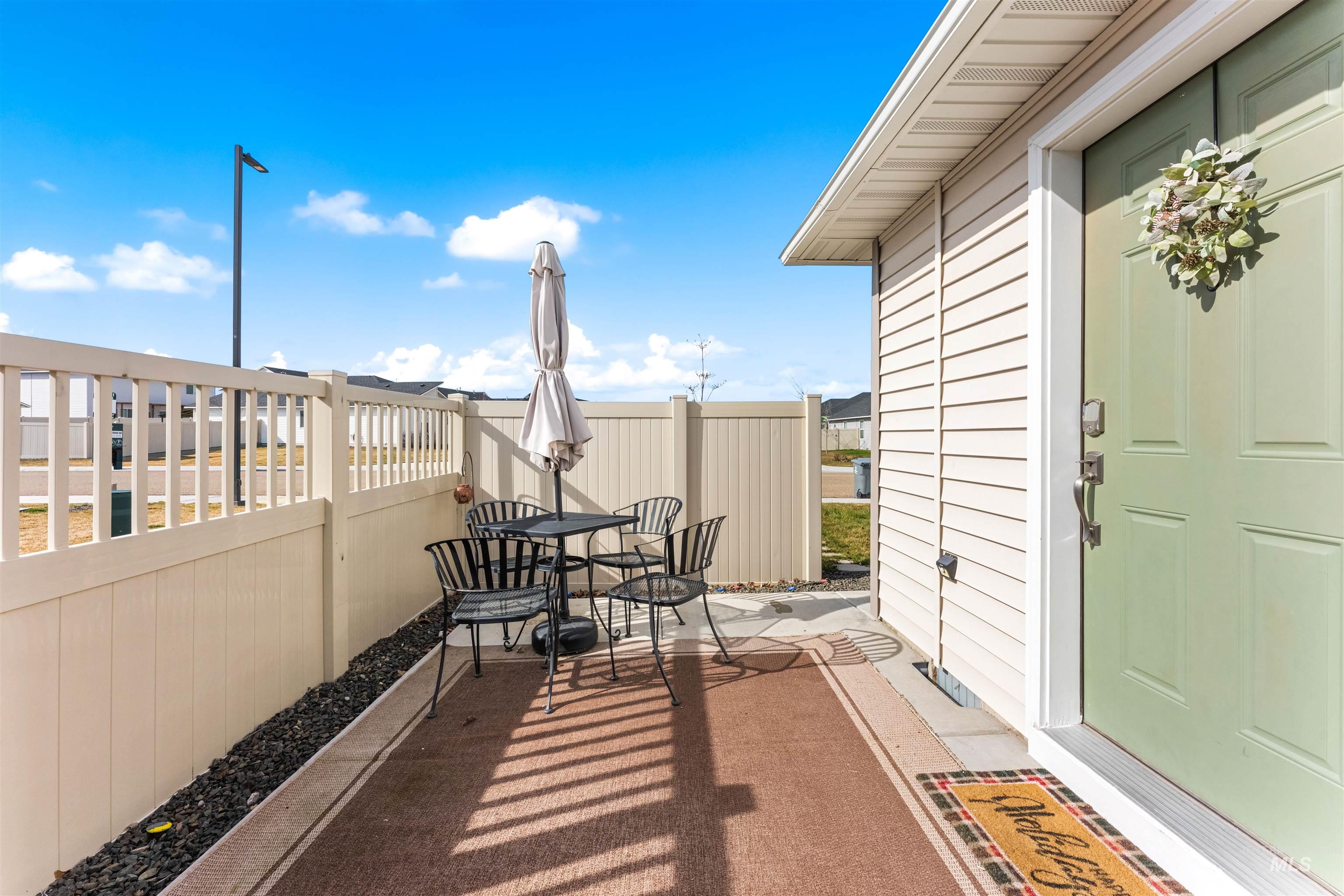 16378 Kelso Way Caldwell, ID 83607 - Photo 5 of 34 View of patio with outdoor dining area
