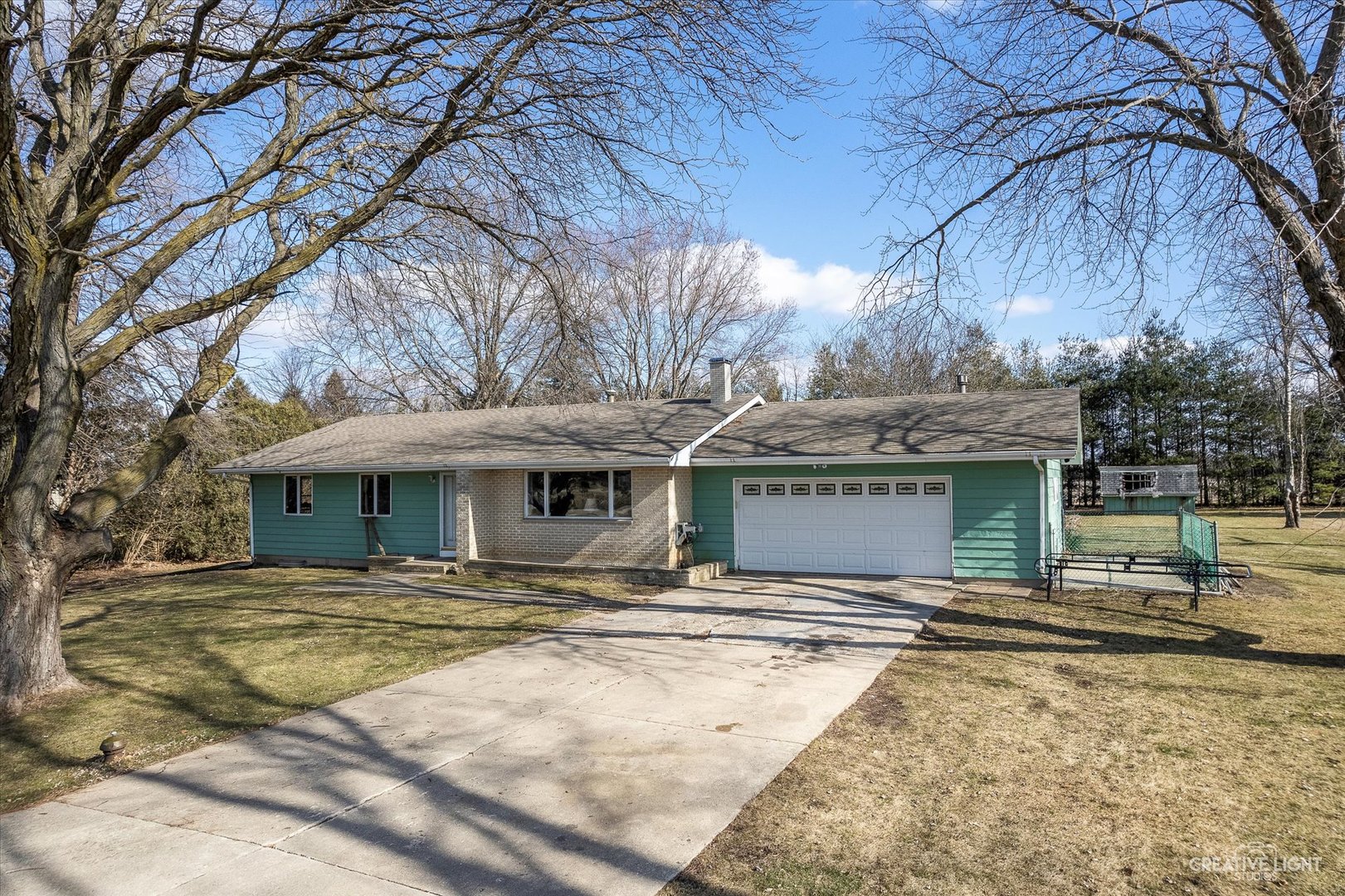 9956 Rimsnider Road Hinckley, IL 60520 - Photo 1 of 22 a house view with a backyard space