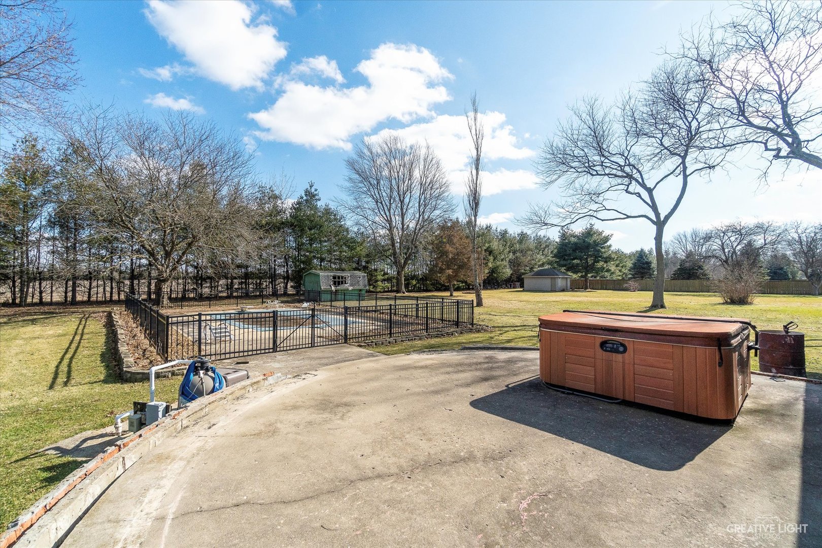 9956 Rimsnider Road Hinckley, IL 60520 - Photo 18 of 22 a view of a swimming pool with a lounge chairs