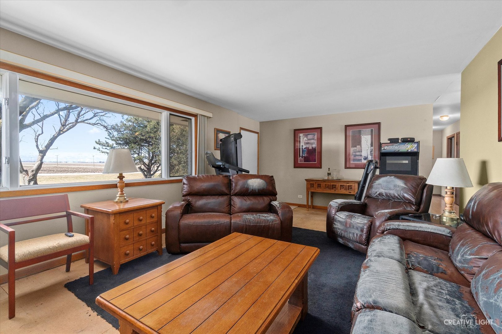 9956 Rimsnider Road Hinckley, IL 60520 - Photo 4 of 22 a living room with furniture and a large window