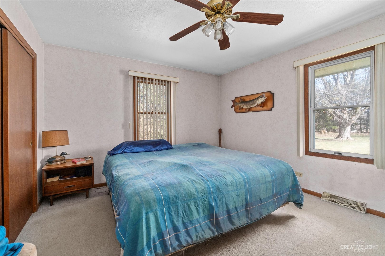 9956 Rimsnider Road Hinckley, IL 60520 - Photo 8 of 22 a bedroom with a bed and window