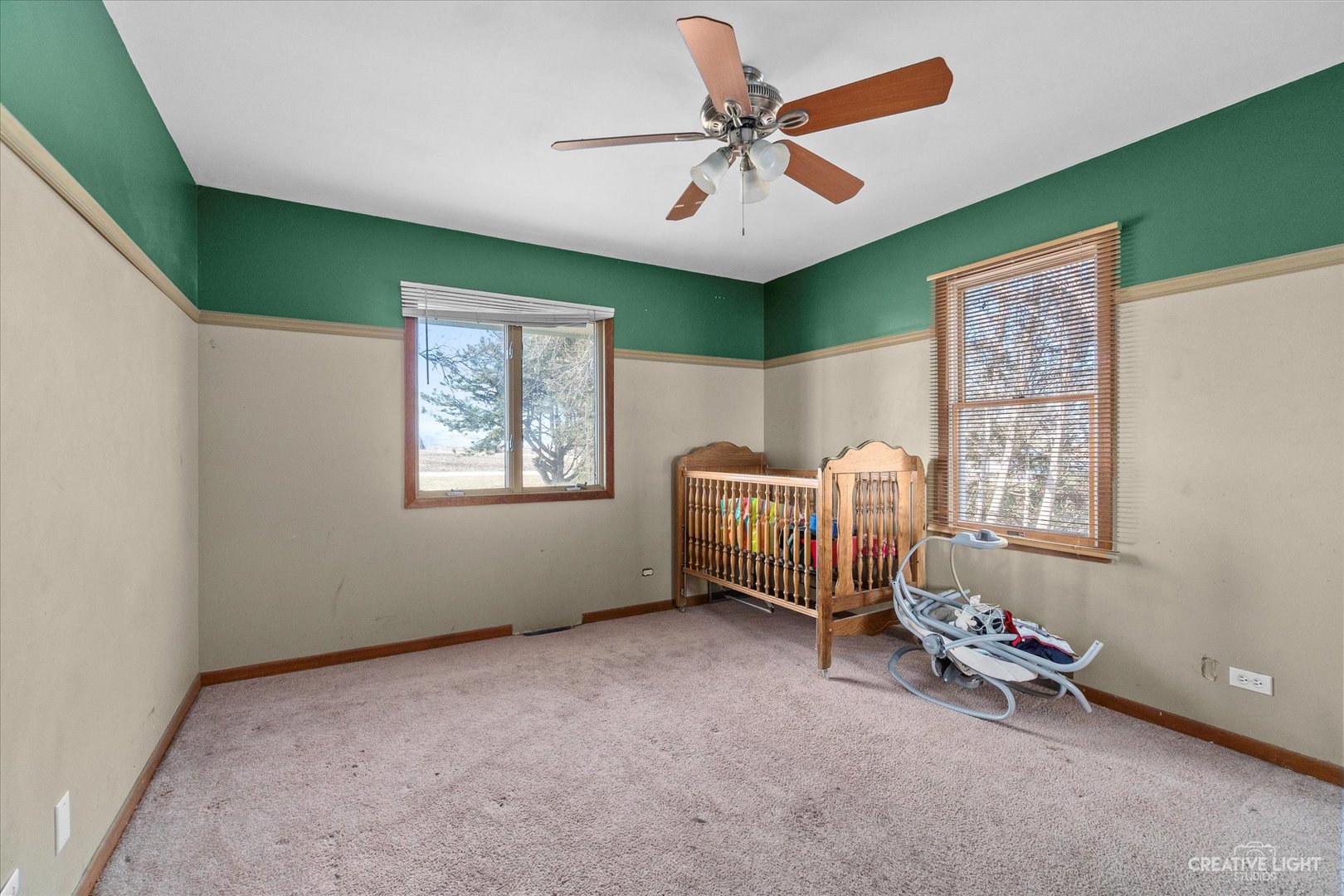 9956 Rimsnider Road Hinckley, IL 60520 - Photo 10 of 22 a living room with furniture and a ceiling fan