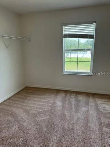 an empty room with a window